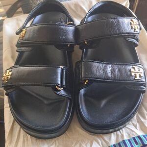 Tory Burch Black Sandals with Gold Emblems